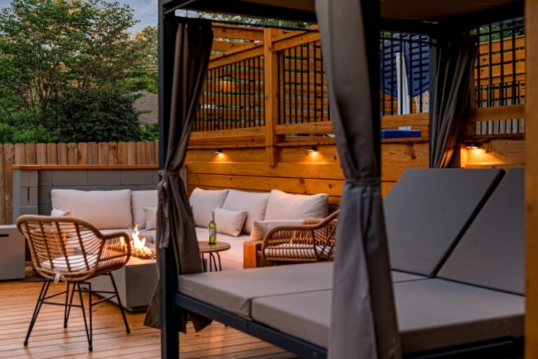 Backyard & Patio at Luxury 5BR Oasis in Atlanta, GA – private covered king-sized daybed retreat, ideal for relaxing, reading, or enjoying