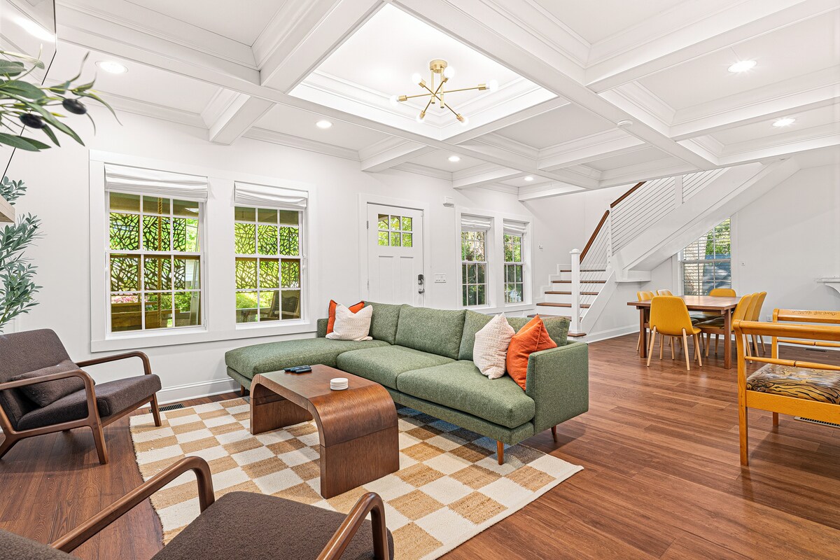 Living Room at Luxury 5BR Oasis in Atlanta, GA – bright open concept living room with extra tall ceilings, designer seating and plenty